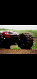 RC car navigates muddy terrain in action-packed wallpaper.