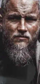 Rugged Viking warrior with a fierce expression and bearded face.