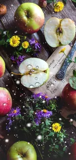 Rustic wallpaper with apples and flowers on wooden background.