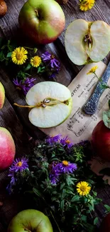 Rustic scene with apples and wildflowers on a wooden table, perfect wallpaper for nature lovers.