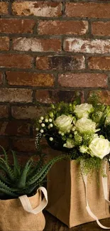 Rustic brick wallpaper with floral decor and green plants for mobile.