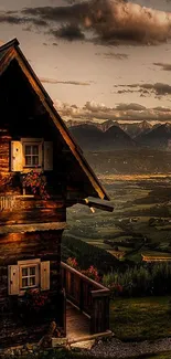 Rustic cabin with mountain view at sunset, scenic landscape.