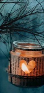 Candle glowing inside a rustic glass jar with a heart cutout.