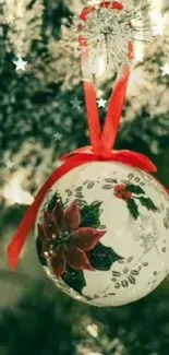 Festive Christmas ornament with red ribbon hanging on a tree with sparkling star effects.