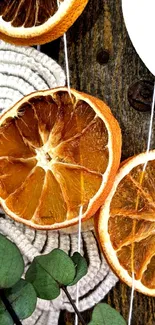 Rustic wallpaper with dried orange slices and eucalyptus.