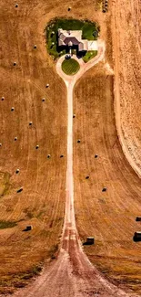 Aerial view of a rustic countryside with a home and farmland, ideal for mobile wallpaper.