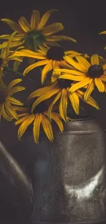 Yellow flowers in a rustic metal watering can on a dark background.