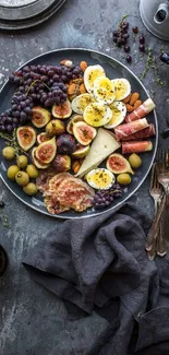 Rustic platter with figs, cheese, and eggs.