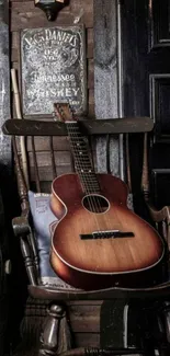 Vintage guitar on a rustic wooden chair with a whiskey sign.