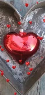 Rustic metal heart mold with red heart inside.