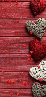 Red wooden background with woven hearts design.