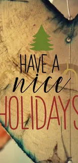 A festive tree slice wallpaper with 'Have a Nice Holidays' message.