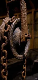Closeup of a rustic metal chain with dark background.