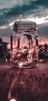 Rustic jar filled with fairy lights against a moody twilight sky.
