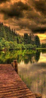 Serene sunset over a lake with lush greenery and a wooden dock.