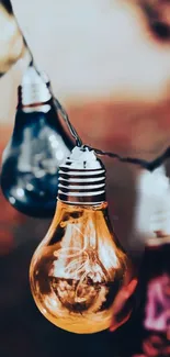 Orange and blue light bulbs in a cozy, blurred background setting.