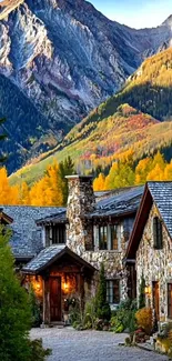 Rustic cabin with mountain backdrop and autumn colors.