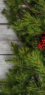 Rustic wood and pine branches with red berries wallpaper.