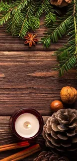 Rustic holiday wallpaper with pinecones and candle.