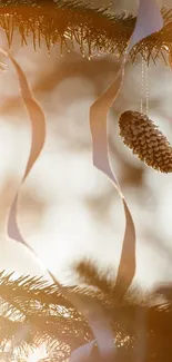 Rustic pinecone hanging on a tree with ribbons and soft winter sunlight.