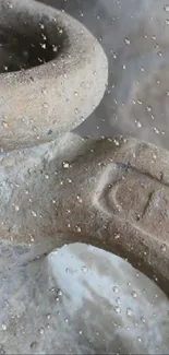 Beige pottery with water droplets on surface.