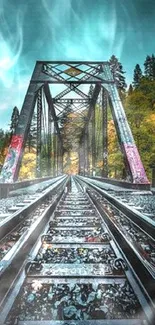 Scenic railway bridge with dramatic sky in a forested area, highlighting adventure.