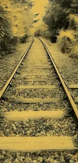 A tranquil railway track with yellow ochre tones and lush green foliage.