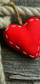 Rustic wallpaper with red heart design on wooden texture.