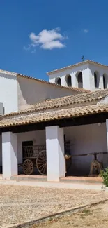 Rustic Spanish building with blue sky.