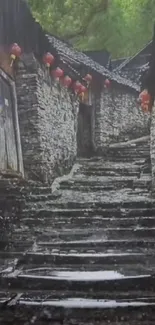 Rustic stone stairway in a village with red lanterns.