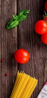 Rustic kitchen wallpaper with tomatoes, basil, and pasta on wood.