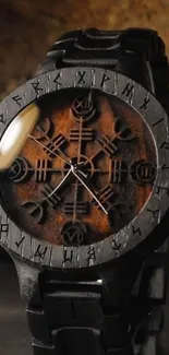 Wooden watch with decorative runic engravings on the face.