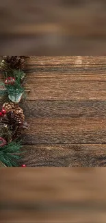 Rustic wooden wallpaper with pinecones and red berries for a festive look.