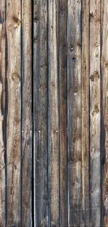 Rustic wooden texture wallpaper with vertical planks in warm brown hues.