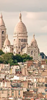 Sacre Coeur Basilica over Paris rooftops.