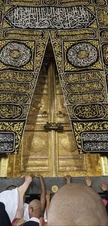 Sacred golden door with intricate calligraphy and worshippers in reverence.
