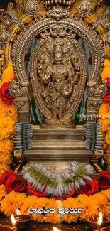 Hindu idol surrounded by marigolds and lights