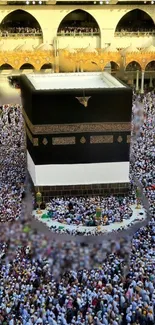 Aerial view of the Kaaba with pilgrims gathered around in Mecca.