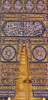 Golden Kaaba door with intricate design.