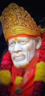 Vibrant Saibaba idol with red and gold accents.