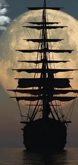 Silhouette of a sailboat against a full moon over calm waters.