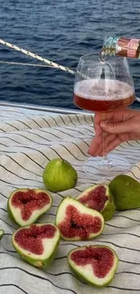 Nautical scene with figs and wine on a yacht for a relaxing vibe.