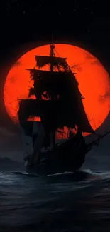 Silhouette of a ship against a red moon over dark ocean waters.