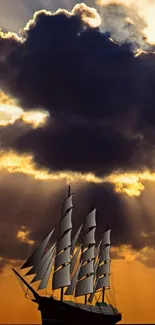 Silhouette of a sailing ship against a vibrant orange sunset sky.