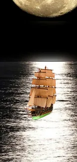 Sailing ship under moonlight on ocean.