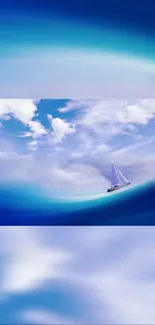 Sailboat on vast ocean under vibrant blue sky.