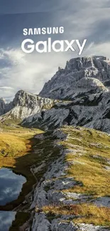 Samsung Galaxy wallpaper featuring mountain scenery and reflection.