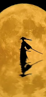 Samurai silhouette with moon reflection wallpaper.