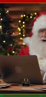 Santa Claus using a laptop by the Christmas tree with festive lights.