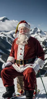 Santa Claus sitting on a snowy mountain with skis.